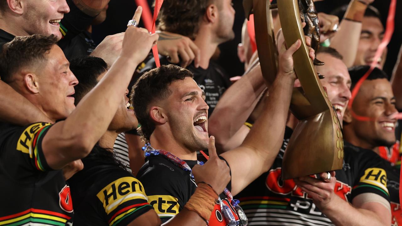 SYDNEY, AUSTRALIA - OCTOBER 02: Nathan Cleary and Isaac Yeo of the Panthers hold aloft the NRL Premiership Trophy after victory in the 2022 NRL Grand Finalduring the 2022 NRL Grand Final match between the Penrith Panthers and the Parramatta Eels at Accor Stadium on October 02, 2022, in Sydney, Australia. (Photo by Mark Kolbe/Getty Images)