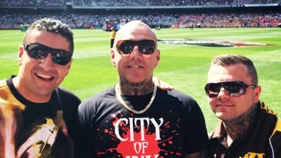 Kazem Hamad (left) at the footy with Toby Mitchell and senior Mongol bikie Tyrone Bell. Picture: Instagram