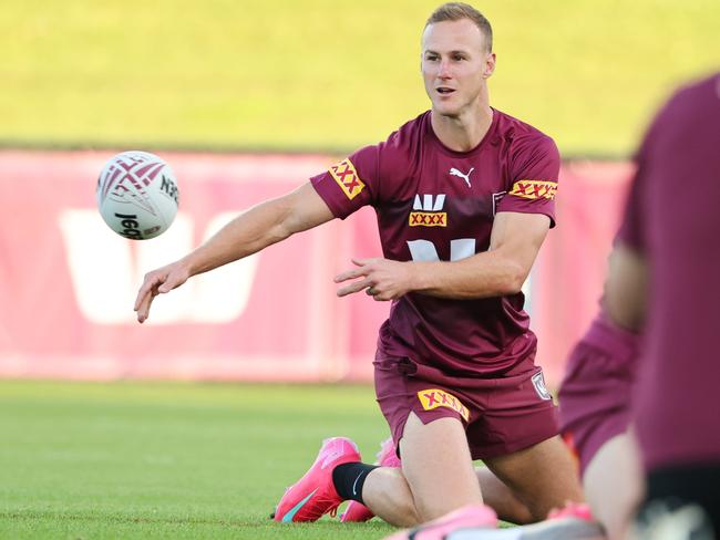 Daly Cherry-Evans leads the Maroons out to an uphill battle in game one. Picture: Lachie Millard
