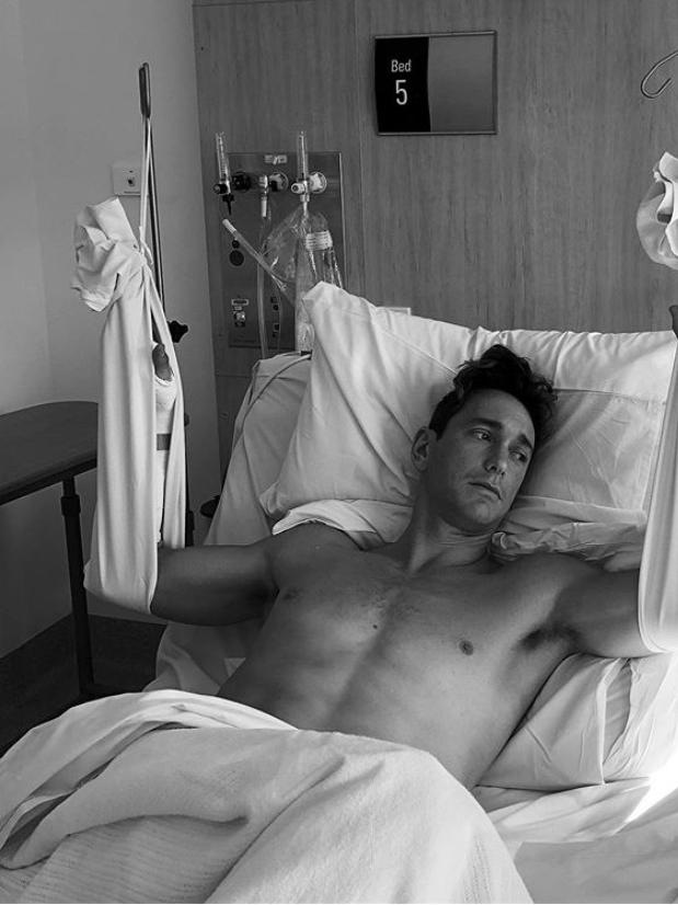 Surf life saving star Ali Day recovers in hospital after surgery on his two broken wrists. Picture: @alastairday via Instagram