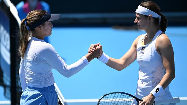 HOBART, AUSTRALIA – JANUARY 09: Sofia Kenin of USA shakes hands with Greet Minnen of Belgium after winning the match during day two of the 2024 Hobart International at Domain Tennis Centre on January 09, 2024 in Hobart, Australia. (Photo by Steve Bell/Getty Images)