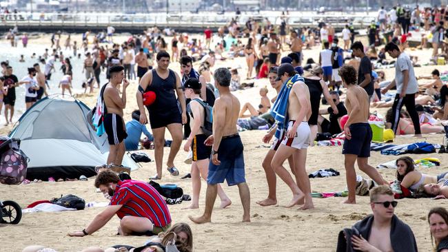 A crowded St Kilda beach on Sunday afternoon. Picture: NCA NewsWire/David Geraghty