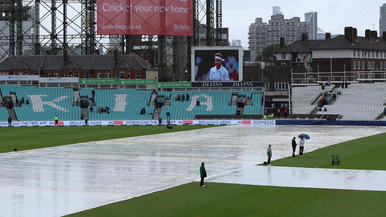 Rain put an end to day four play. (Photo by ADRIAN DENNIS / AFP)