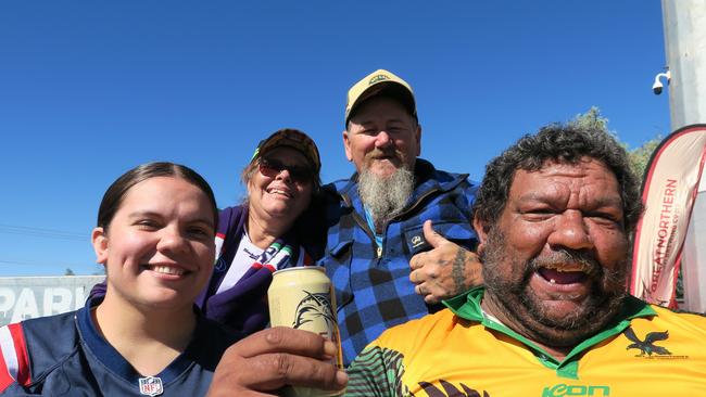 Bobby Ross, Hayley Ross, Brad Irwin, and Budgie Irwin. Coming down from Katherine, the group say it's their first time in Alice Springs and they love it.