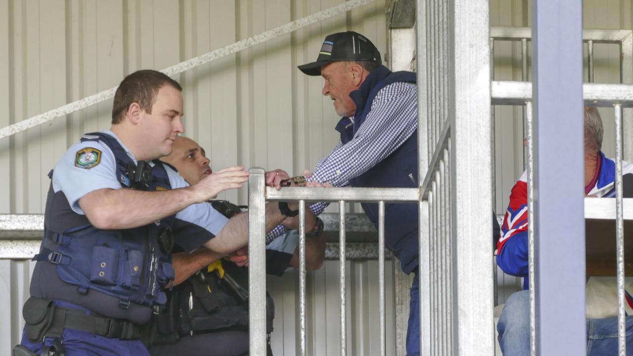 Football commentator Dougie Graham arrested by police during the Grafton Ghosts game