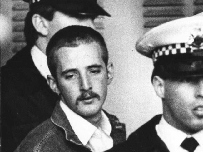 Under heavy police guard, Julian Knight, 19, who shot dead 7 people and wounded 19 in Hoddle Street, Clifton Hill. Hoddle St massacre. Pic Michael Potter