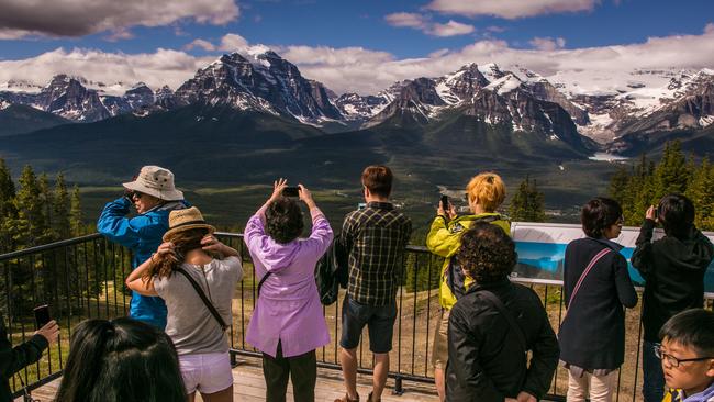 Tourists near Alberta in Canada. The country has become a hotspot for Australian travellers, agents say. Picture: George Rose/Getty