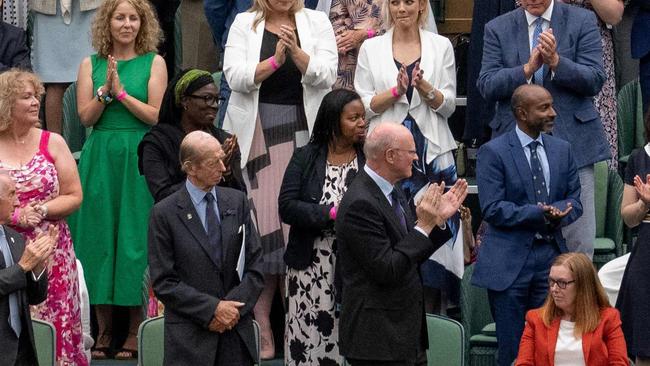 The Royal Box at Wimbledon stands and applauds Sarah Gilbert (Bottom R), one of the people behind the AstraZeneca vaccine. Picture: AFP.