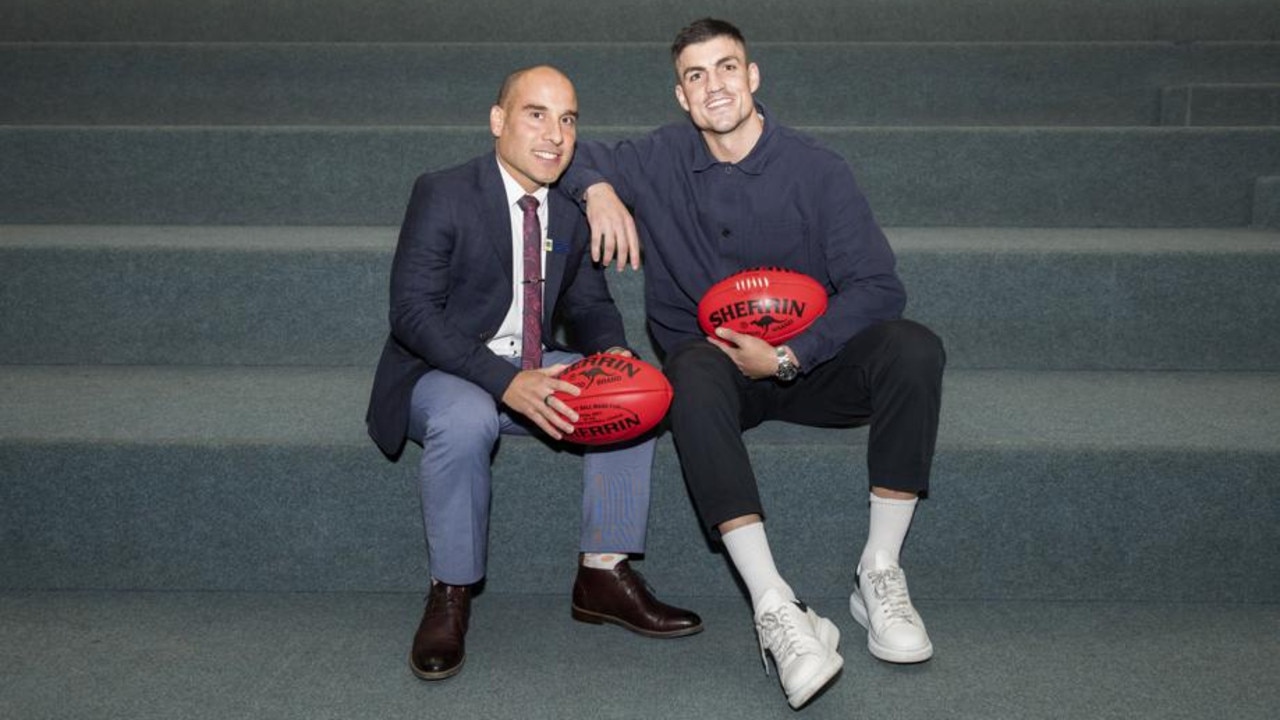 De La Salle College teacher Rob Bonnici with former student and current Collingwood AFL player Brayden Maynard, who is a frequent visitor to the school. Picture: supplied