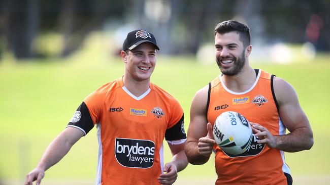 Mitch Moses and James Tedesco during Wests Tigers training at Concord oval. Picture. Phil Hillyard