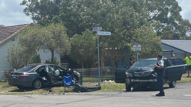 A boy has been taken to hospital after a two-car crash at the intersection of Mort St and George Evans Rd, Killarney Vale. Picture: NewsLocal