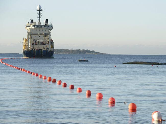 This picture taken on October 12, 2015 shows the C-Lion1 submarine telecommunications cable being laid to the bottom of the Baltic Sea by cable laying ship "Ile de Brehat" off the shore of Helsinki, Finland. Germany and Finland said November 18, 2024 they were "deeply concerned" that an undersea telecommunications cable linking the countries had been severed and opened a probe, at a time of high tensions with Russia. "Our European security is not only under threat from Russia's war of aggression against Ukraine, but also from hybrid warfare by malicious actors," the countries' foreign ministers said in a joint statement. sr/sea/js (Photo by Heikki Saukkomaa / Lehtikuva / AFP) / Finland OUT