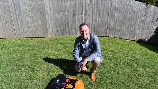 David Mills, GM of McGrath Ballina and Byron, with a model of the Landroid robot mower.