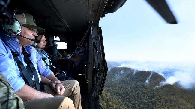 Australian Prime Minister Scott Morrison and wife Jenny look over Binna Burra. Picture: AAP Image/Dave Hunt