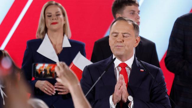 Karol Nawrocki with supporters as exit polls were announced. Picture; AFP.