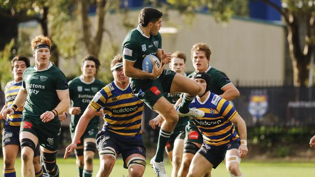 High-flying action from Randwick in the match against Sydney Uni. Pic: Karen Watson