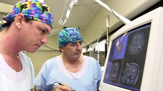 Todd Furlong (Technician) and Mr Reno Rossato (Neurosurgeon). Picture: Scott Radford-Chisholm