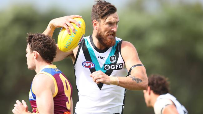 STRONG STATEMENT: Charlie Dixon monstered the Lions defenders in the round one Marsh Community Series match in Queensland. Picture: CHRIS HYDE (AFL Photos/Getty Images).