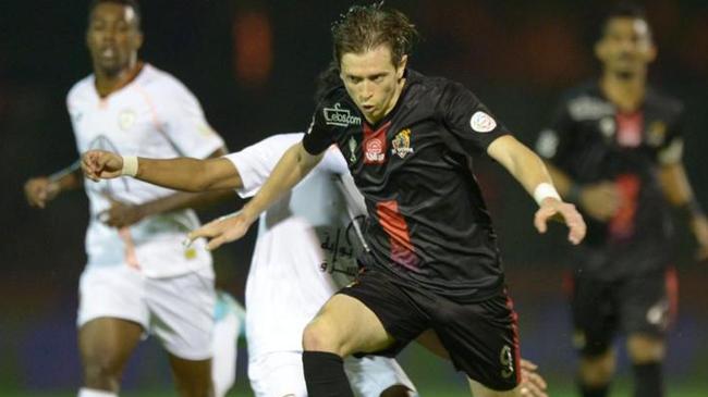 Craig Goodwin skips a tackle for Saudi Arabian club Al Wahda Mekka. Picture: Supplied