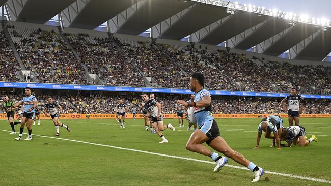 Sharks winger Ronaldo Mulitalo runs in another try against the Cowboys in Round 2. Picture: Ian Hitchcock/Getty Images