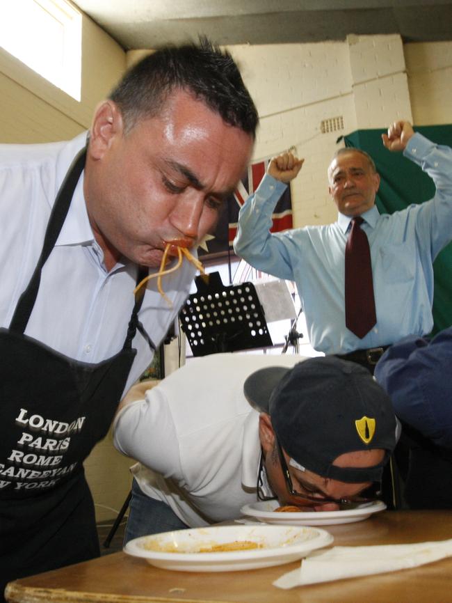 John Barilaro shows off his considerable pasta-eating skills for charity.