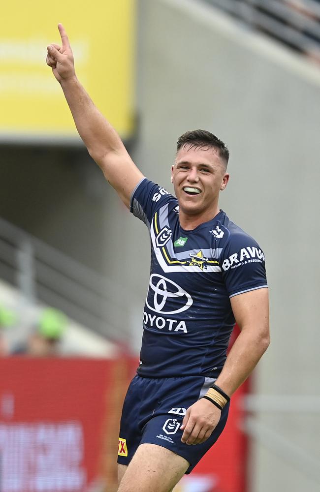 Scott Drinkwater of the Cowboys celebrates after scoring a try during the round one NRL match between the North Queensland Cowboys and the Canberra Raiders at Qld Country Bank Stadium on March 04, 2023 in Townsville, Australia. (Photo by Ian Hitchcock/Getty Images)