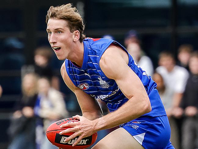 AFL. North Melbourne hold a simulation practice game at Arden St. Matt Whitlock takes possession of the ball going forward. Picture: Ian Currie