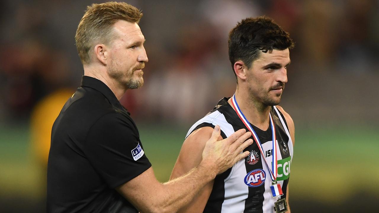 Nathan Buckley with Scott Pendlebury after the Anzac Day presentation ceremony. Picture: AAP Images