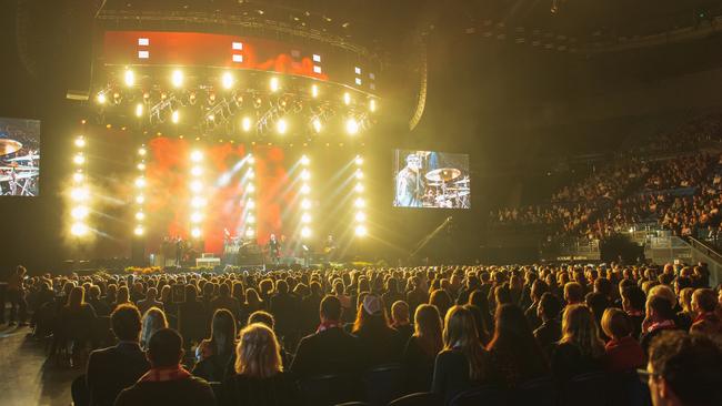 The crowd gathered for the state memorial to Michael Gudinski, held at Rod Laver Arena in Melbourne. Picture: Mushroom Creative House