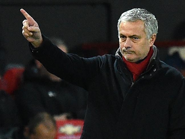 Manchester United's Portuguese manager Jose Mourinho gestures on the touchline during the English Premier League football match between Manchester United and Southampton at Old Trafford in Manchester, north west England, on December 30, 2017. / AFP PHOTO / Oli SCARFF / RESTRICTED TO EDITORIAL USE. No use with unauthorized audio, video, data, fixture lists, club/league logos or 'live' services. Online in-match use limited to 75 images, no video emulation. No use in betting, games or single club/league/player publications.  /