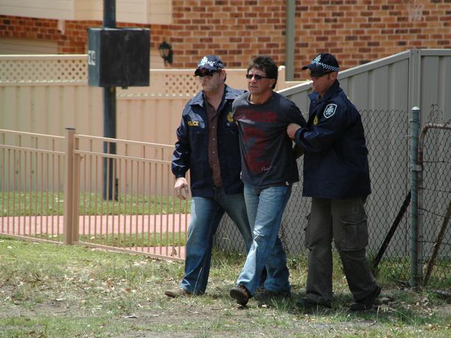 Former Balmain rugby league player Les Mara being arrested by AFP officers after 18 months on the run.