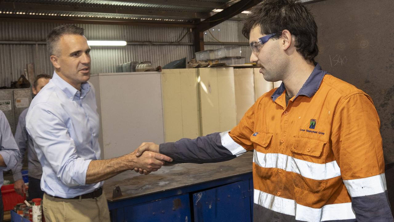 Premier Peter Malinauskas visits Whyalla Hose and Fitting Services and shakes hands with supervisor, fitter and turner Luke Spry. Picture: Brett Hartwig