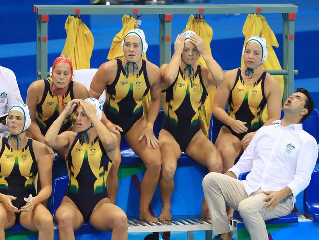 The Quaterfinal of the Women’s Water Polo at the Olympics Aquatic Stadium in Rio de Janeiro, Brazil. Australia vs. Hungary. Official Eddie Denis, left, the team, and Official Dalibor Maslan, centre, throughout the game. Picture: Alex Coppel.