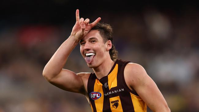 MELBOURNE, AUSTRALIA - JULY 20: Connor Macdonald of the Hawks celebrates kicking a goal during the round 19 AFL match between Hawthorn Hawks and Collingwood Magpies at Melbourne Cricket Ground on July 20, 2024 in Melbourne, Australia. (Photo by Graham Denholm/AFL Photos/via Getty Images)