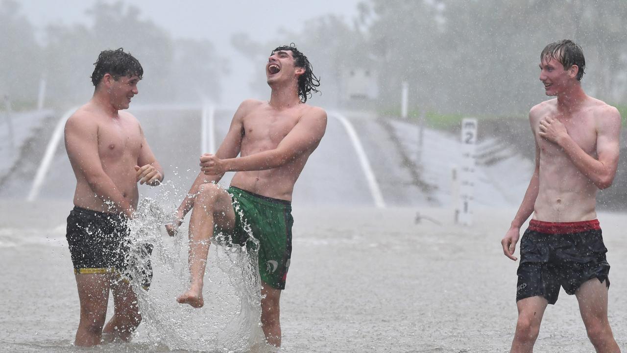 Wet weather in Townsville. Road closed at Allambie Lane, Kelso. Aston Smith, Mitchell Maher and Riley McIntyre. Picture: Evan Morgan