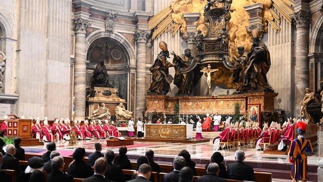 Cardinals and bishops conduct a prayer over the coffin of Australia's Cardinal George Pell, during a funeral mass. Picture: AFP