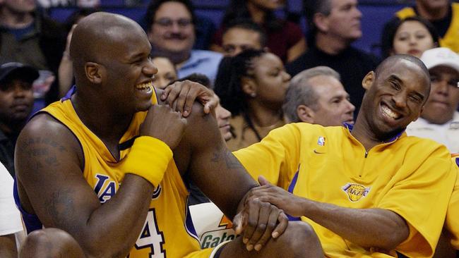 Los Angeles Lakers Shaquille O'Neal shares a laugh with Kobe Bryant. Picture: AP