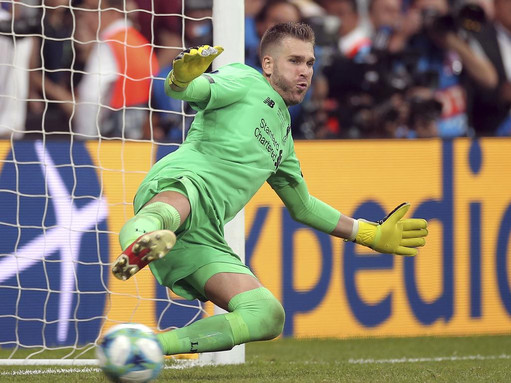 Liverpool goalkeeper Adrian stops a penalty from Chelsea's Tammy Abraham.