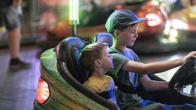 Nova Green and older brother Vincent Green on the dodgem cars at Toowoomba Royal Show, Thursday, March 30, 2023. Picture: Kevin Farmer