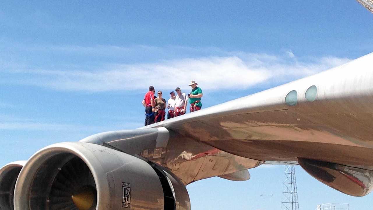 The wing walk on the Boeing 747 at Qantas Founders Museum at Longreach and, right, an aerial view of the on the Qantas Founders Museum at Longreach. Picture: Contributed