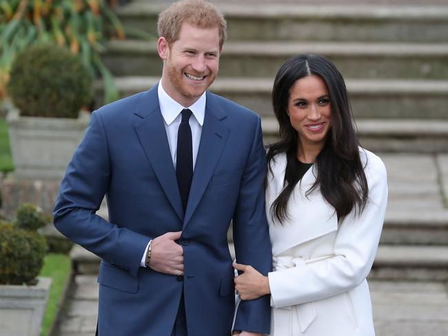 Prince Harry and Meghan Markle beamed as they appeared at Kensington Palace. Picture: AFP/Daniel Leal-Olivas