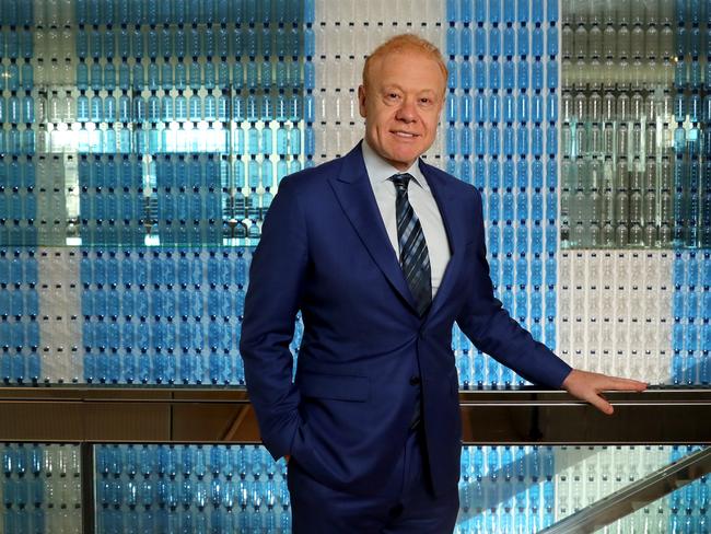 28/11/2018: Anthony Pratt in front of a wall of plastic bottles at the Visy office in Melbourne. Stuart McEvoy/The Australian.