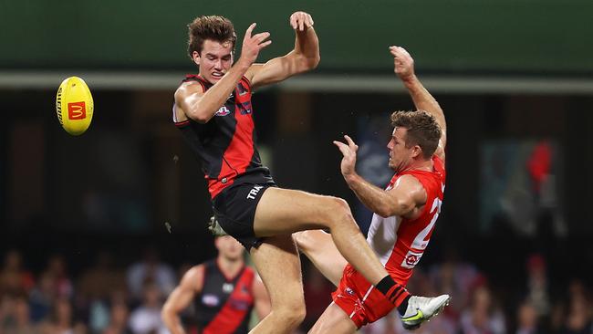 Essendon defender Zach Reid collides with Luke Parker. Picture: Mark Kolbe/Getty Images