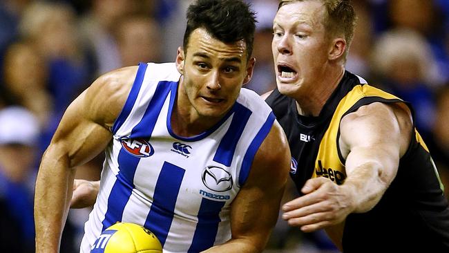 Robbie Tarrant battles Jack Riewoldt. Picture: Wayne Ludbey