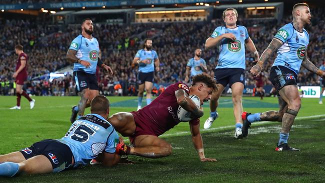 Dane Gagai crosses the line to bring Queensland back in the game.