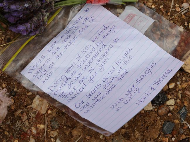 A note left at the Whispering Wall roadside sign in the Barossa Valley for Kobi. Picture: NCA NewsWire / David Mariuz