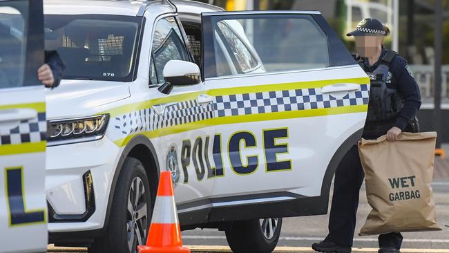 Police at the scene at Minicozzi shopping centre Payneham road. Picture: Roy VanDerVegt