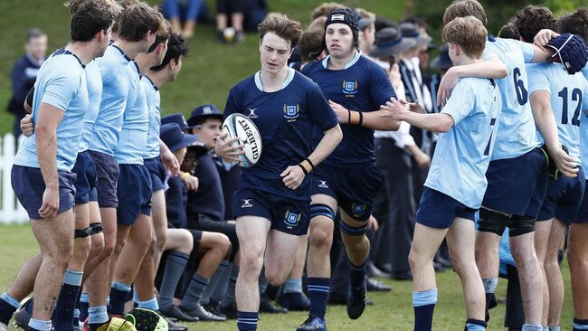 Brisbane Grammar School captain Ryan Shaw leads his team on last weekend. Picture: Tertius Pickard