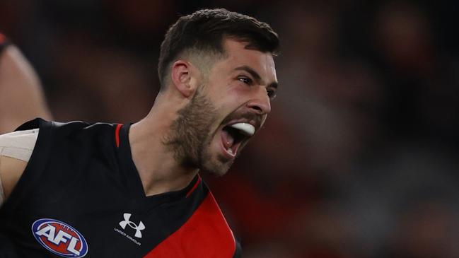 MELBOURNE, AUSTRALIA - JULY 29: Kyle Langford of the Bombers celebrates a goal during the round 20 AFL match between Essendon Bombers and Sydney Swans at Marvel Stadium, on July 29, 2023, in Melbourne, Australia. (Photo by Darrian Traynor/AFL Photos/via Getty Images)