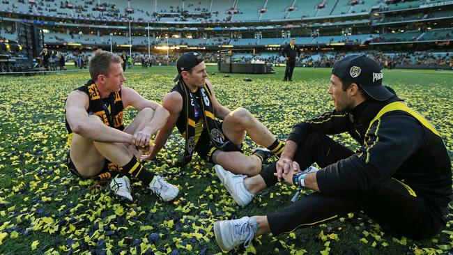 Dylan Grimes, David Astbury and Alex Rance after the 2020 premiership. Picture: Mark Stewart